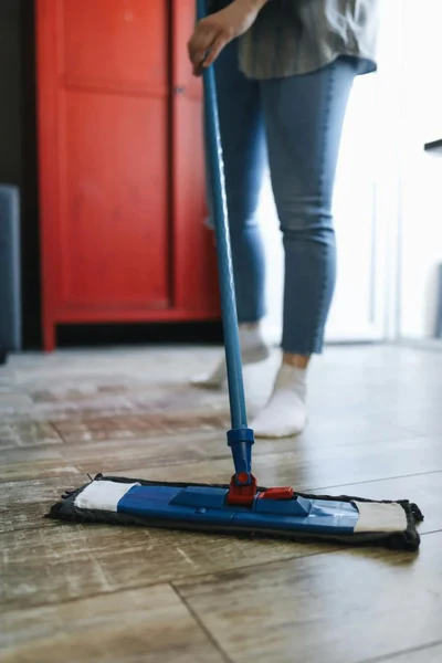Mopping the wood look tile flooring